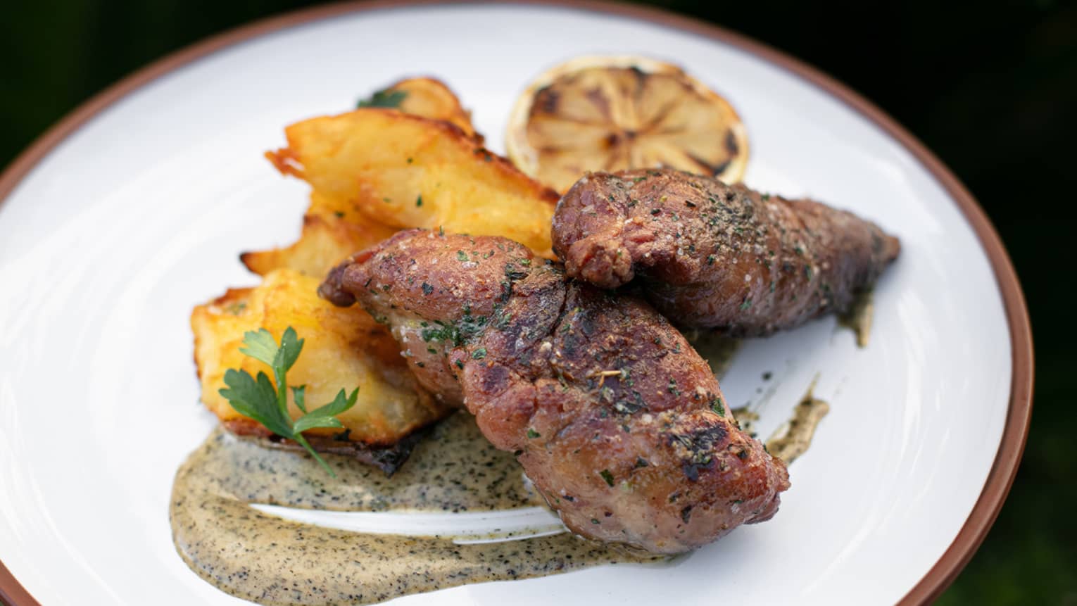 Sweetbreads topped with lemon pickled in olive oil.