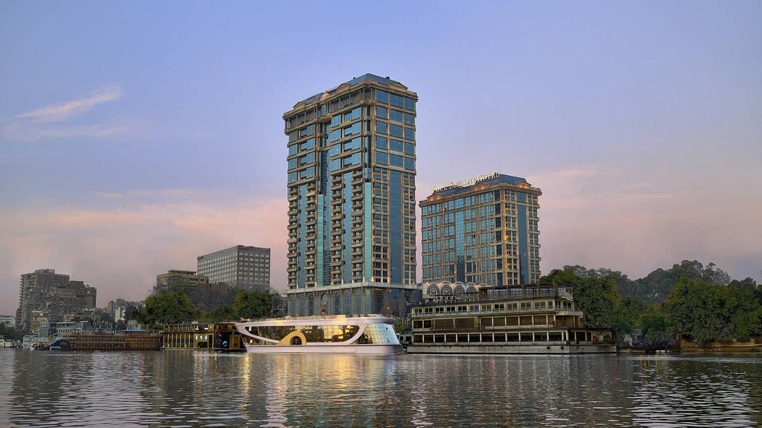 Cairo at the First Residence exterior illuminated at sunset