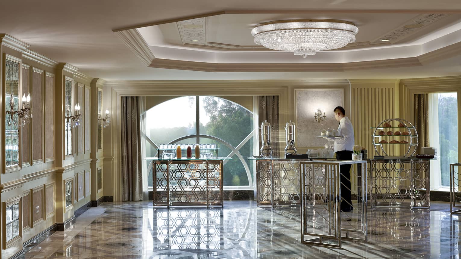 Versaille pre-function foyer with beverage service setup, large window with view
