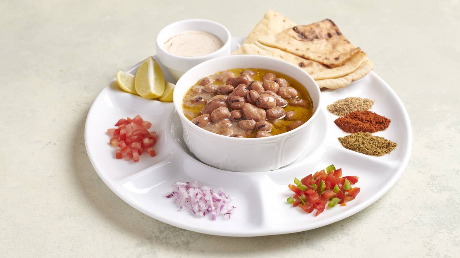 Traditional Egyptian Ful with condiments