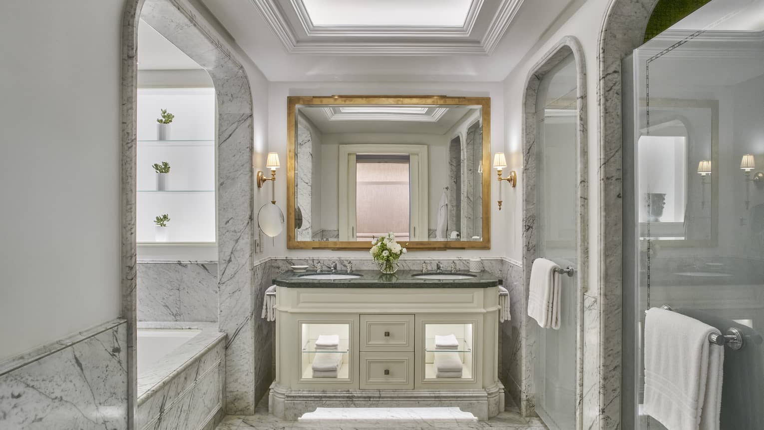 Marble bathroom with shower room and separate sunken bath tub