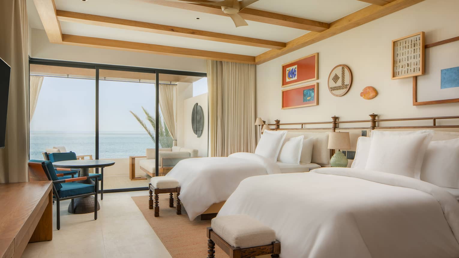 Luxury oceanfront casita room with two double beds at Four Seasons Resort Cabo San Lucas at Cabo Del Sol