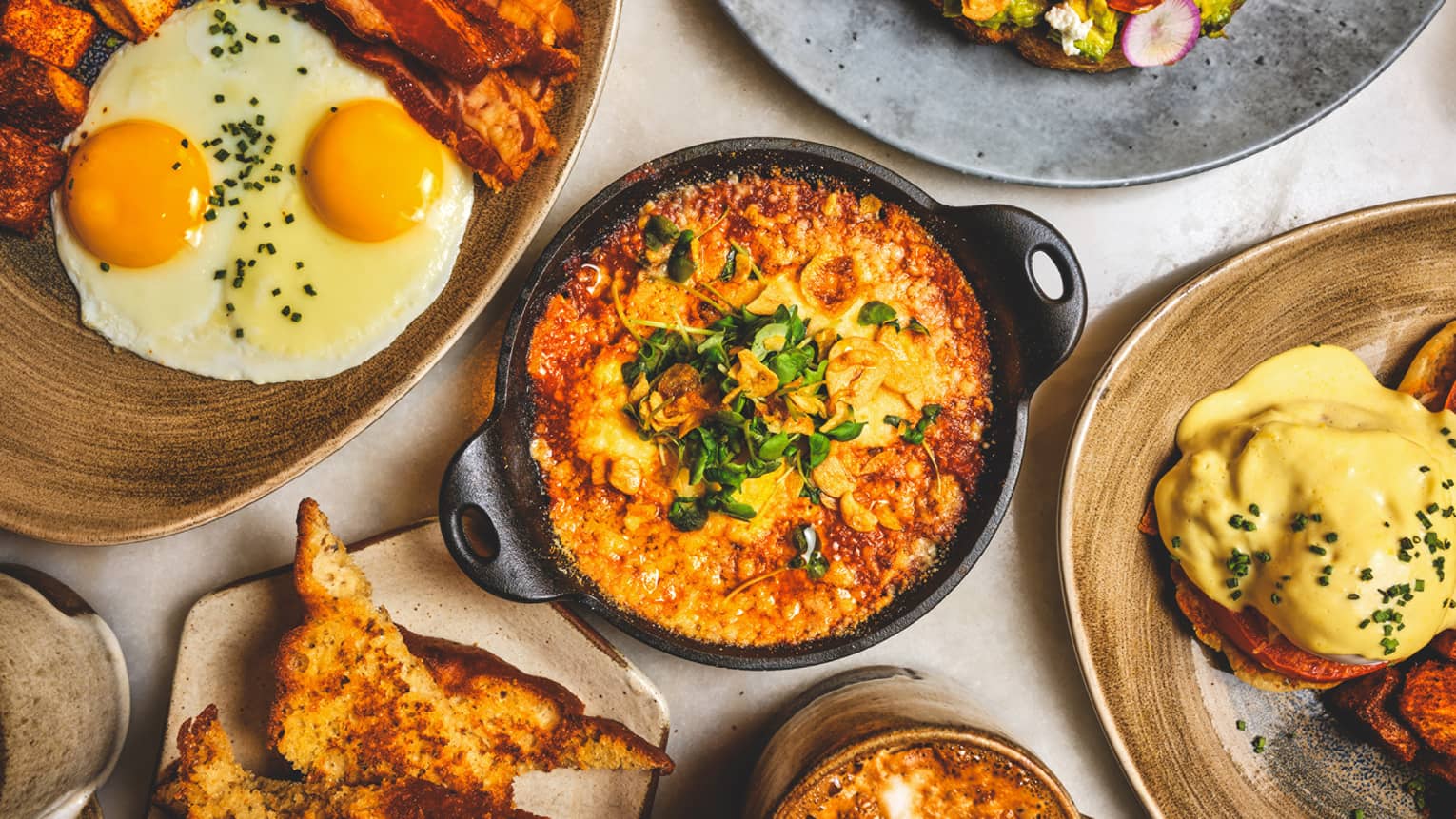 A variety of brunch dishes arranged on a table