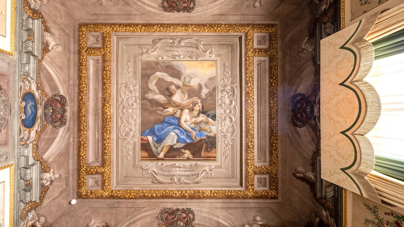 Ornate, historic, painted ceiling of Gallery Suite at Four Seasons Hotel Florence
