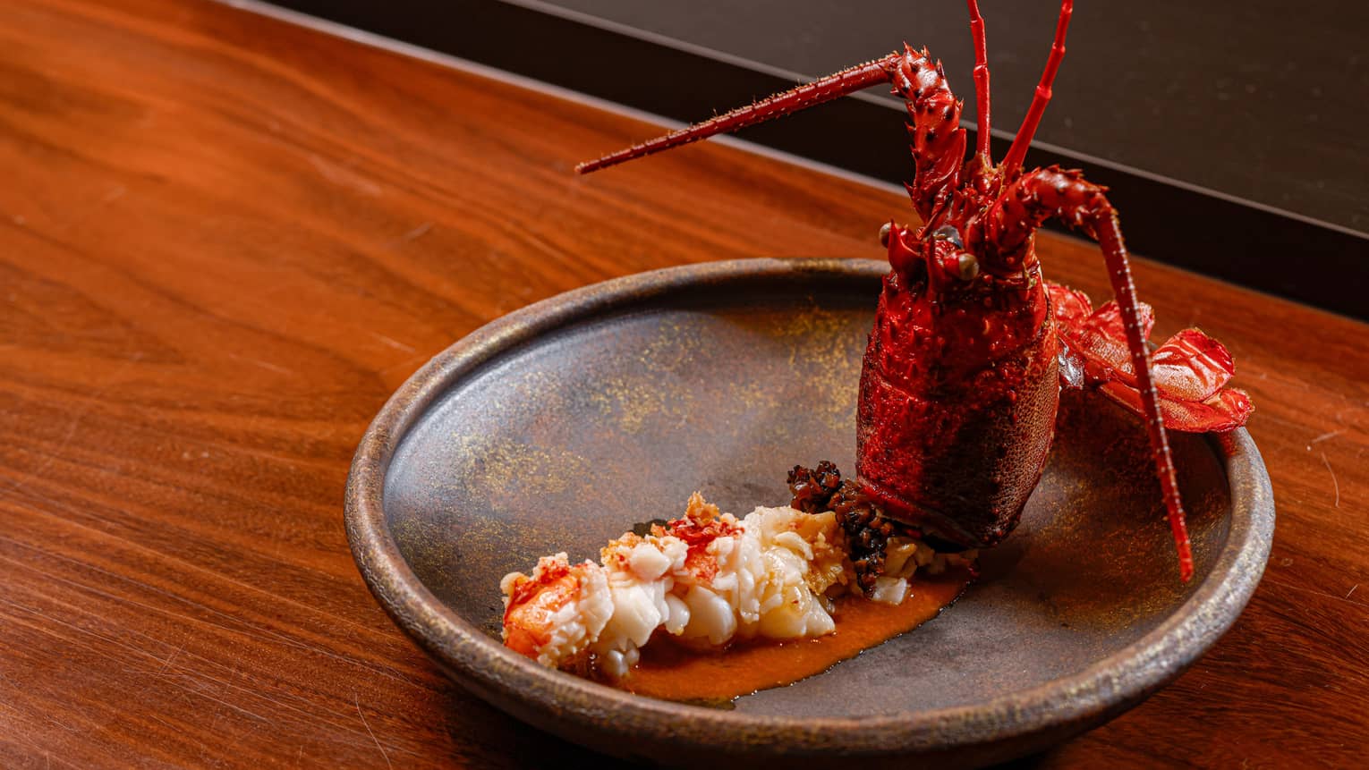 Teppanyaki Grilled Ise Ebi dish, featuring an artfully displayed cooked lobster