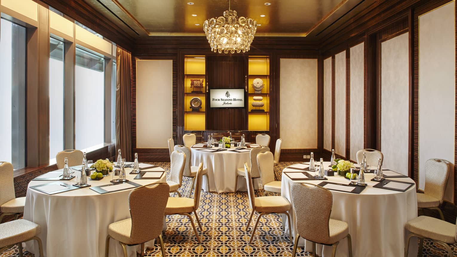 Kirana meeting room with small round banquet tables 