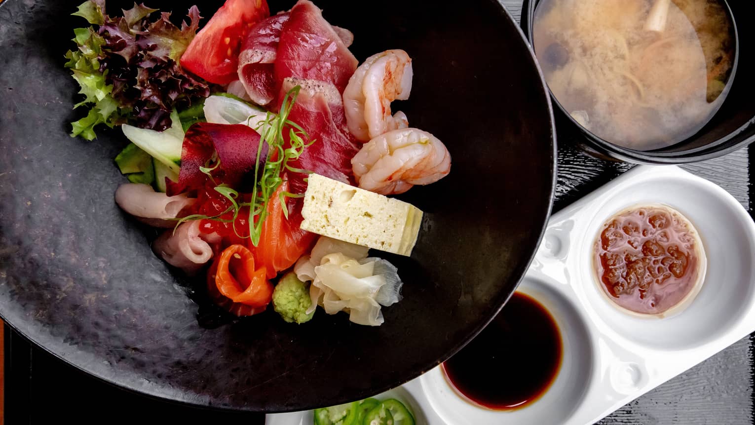Chirashi Don, a variety of dishes including miso soup and sashimi