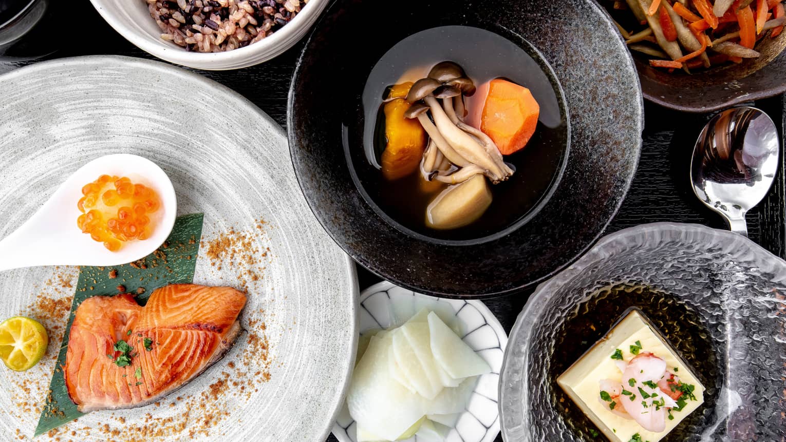 Aerial view of traditional Nourish spread, including salmon, sweet potato and mushroom soup