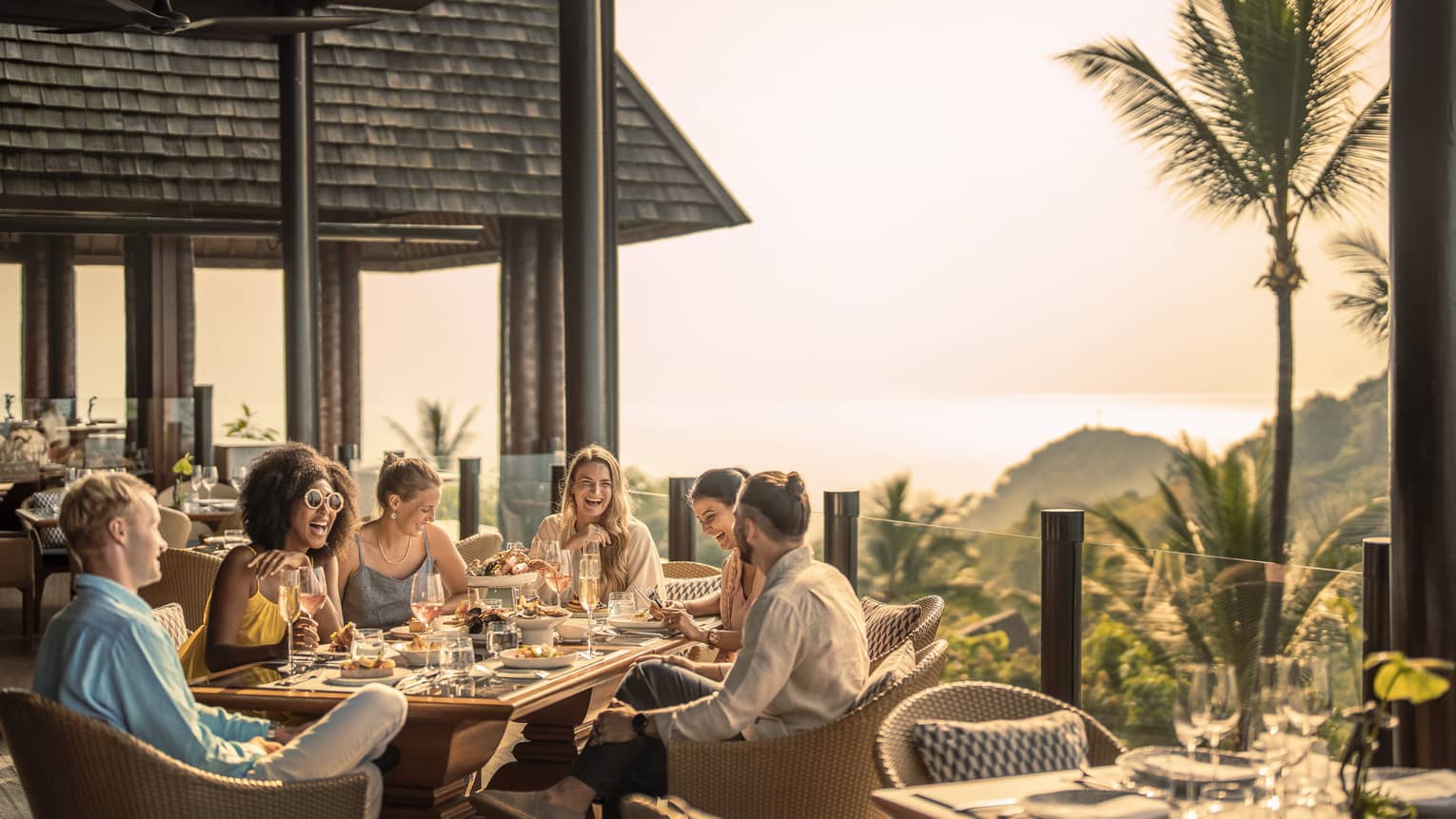 Group of friends enjoys outdoor traditional Thai brunch