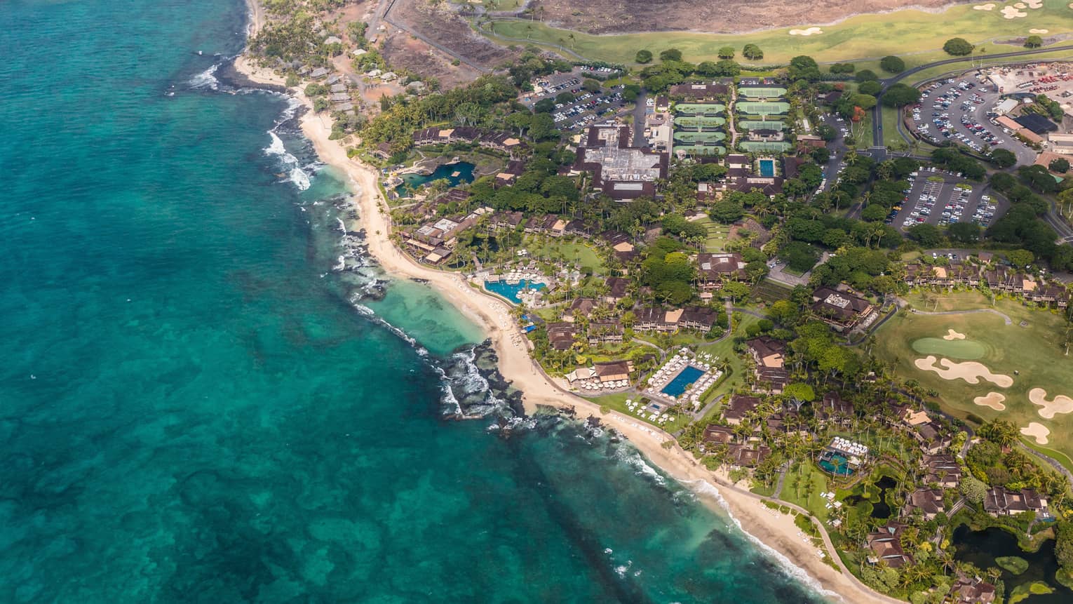 Aerial view of Four Seasons Resort Hualalai, beach and shoreline