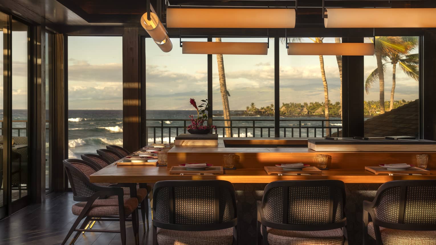 U-shaped sushi bar at tropical luxury resort with ocean view