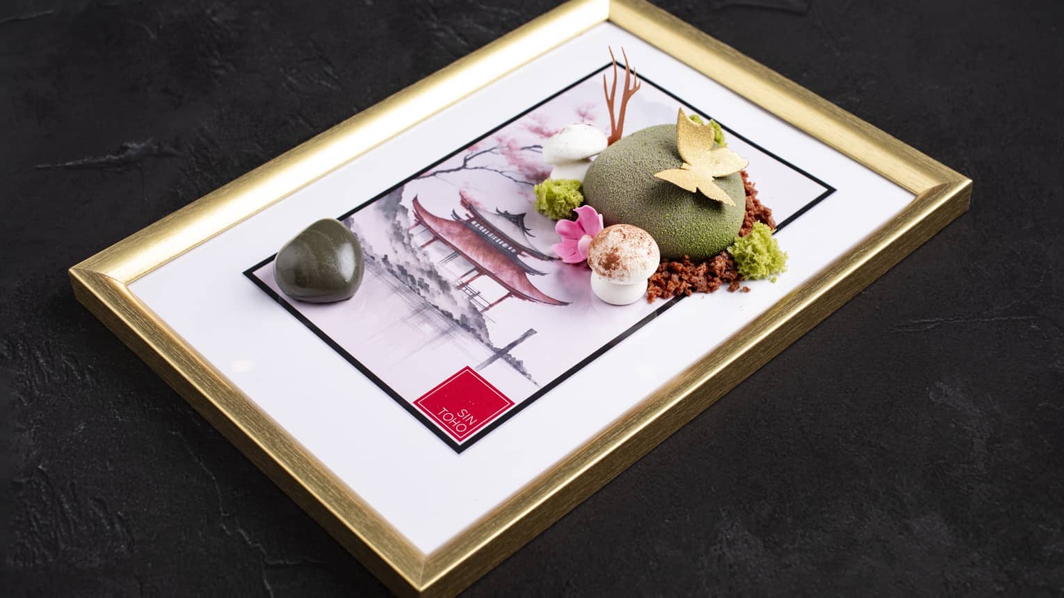 Zen Rock dessert served on an art print of a Japanese temple
