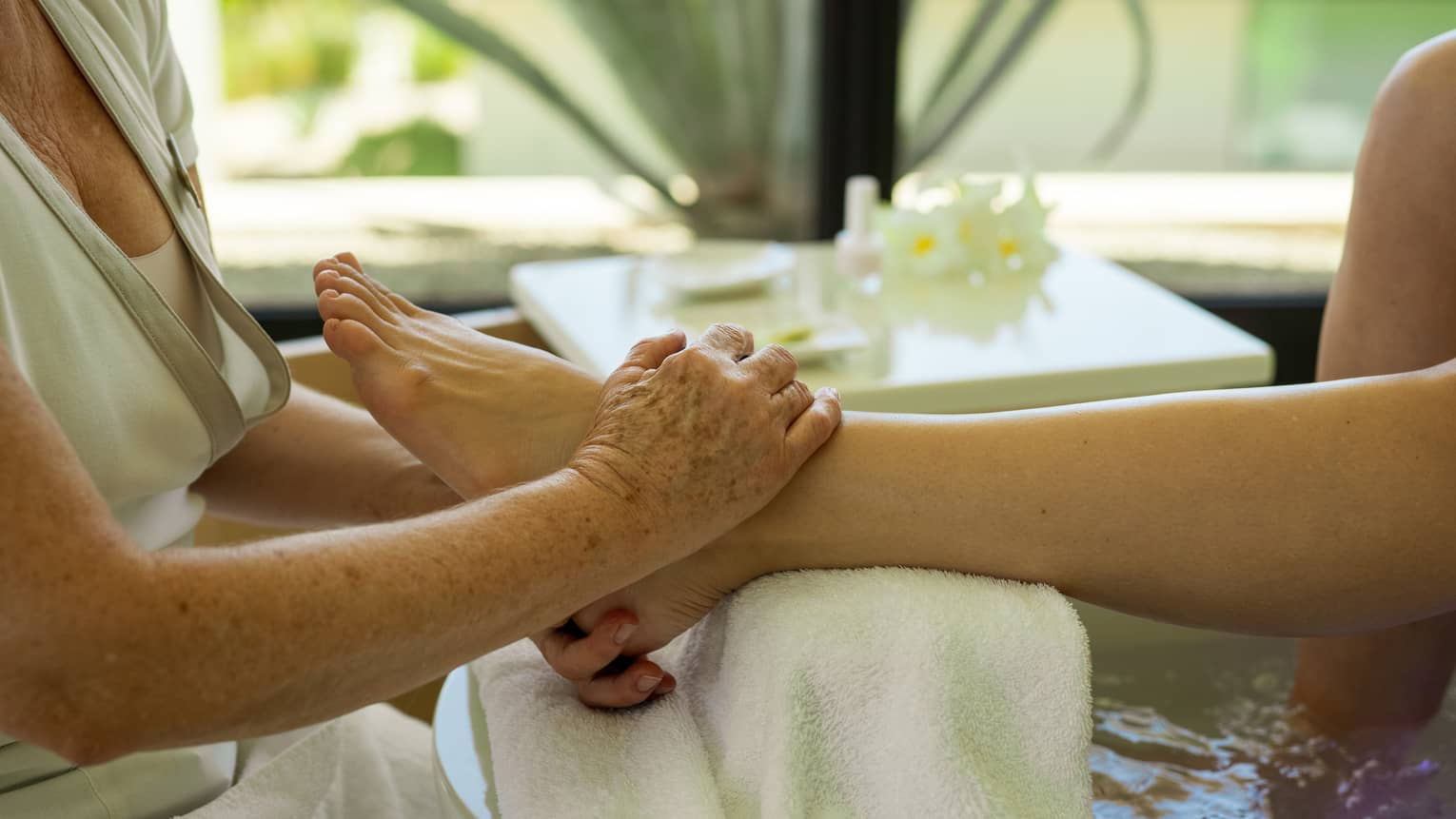 A person gets a pedicure at salon