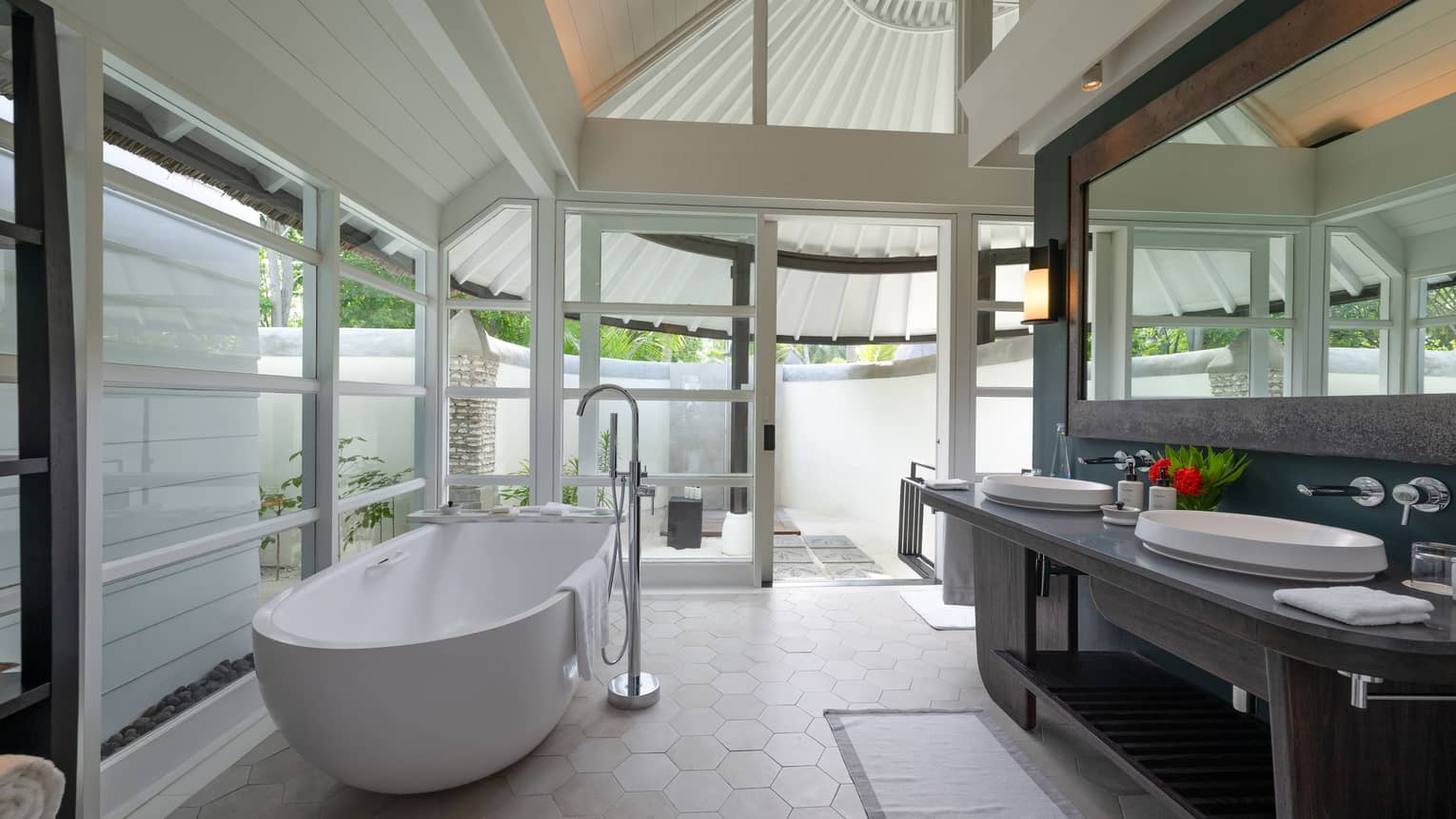 Bathroom of the sunrise family beach villa with pool