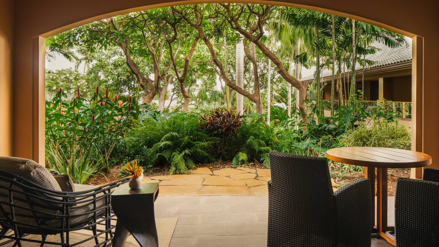 Garden-view lanai at tropical resort