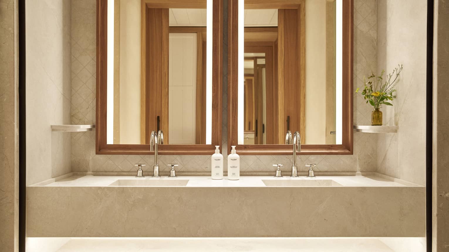Bathroom with illuminated double vanity at Four Seasons Resort Mallorca