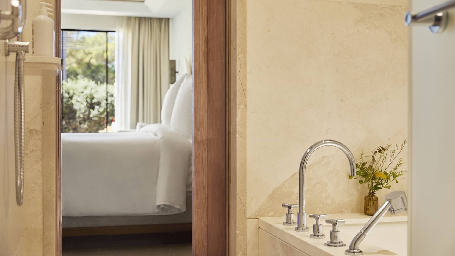 Bathroom looking into a guest room at Four Seasons Resort Mallorca