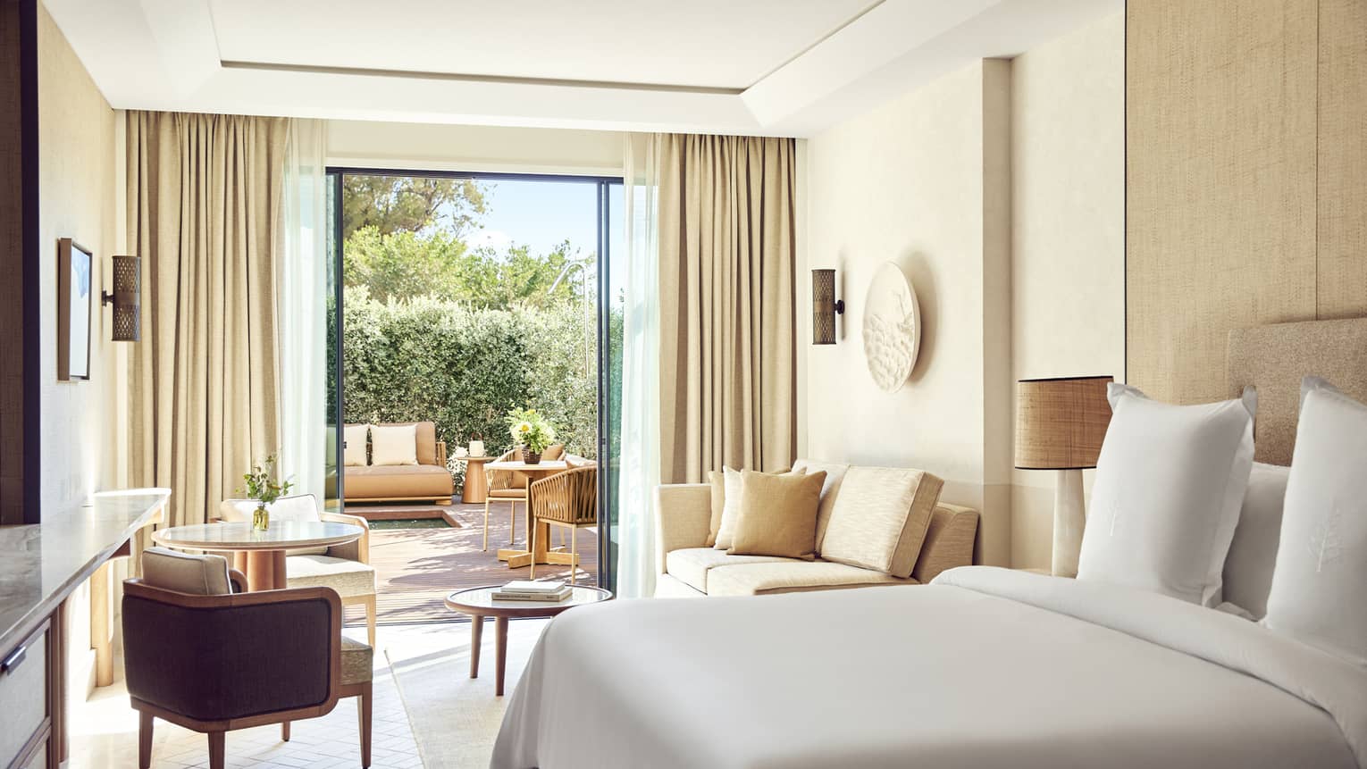 Luxury hotel room with garden view and terrace at Four Seasons Resort Mallorca