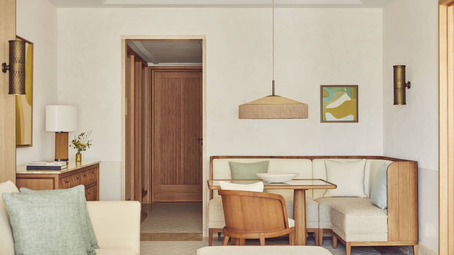 Luxury suite with contemporary dining area and living room at Four Seasons Resort Mallorca