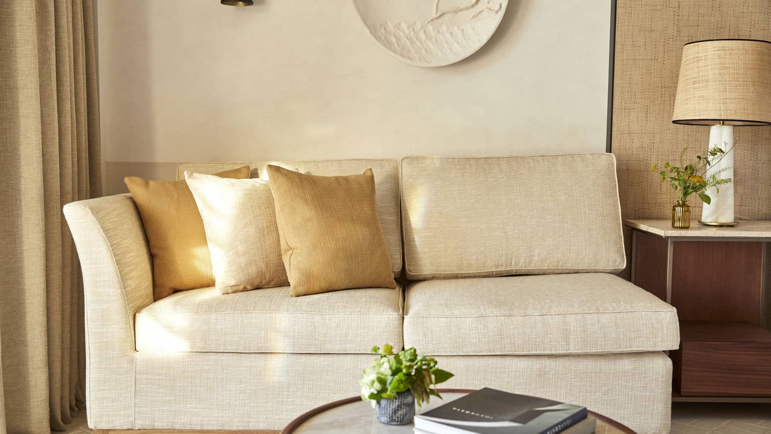 Chaise longue and coffee table in luxury hotel room