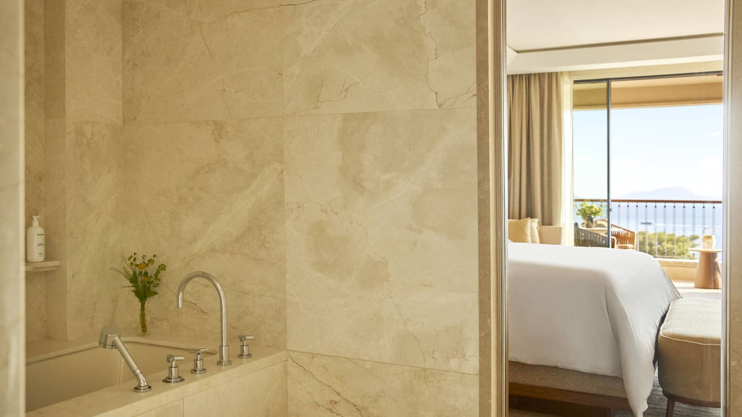Bathroom and guest room at Four Seasons Resort Mallorca