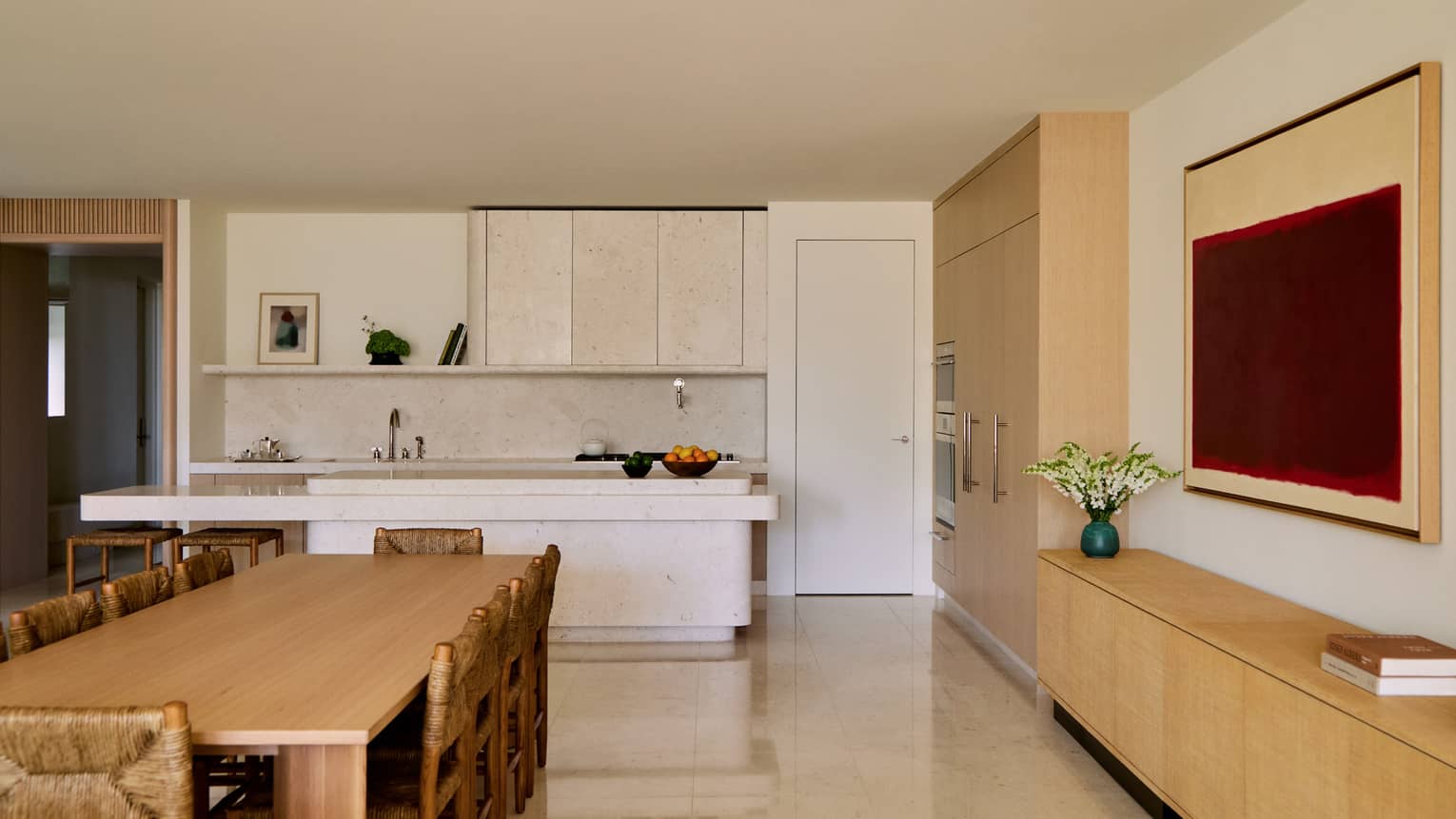 Modern kitchen and dining area of a private villa