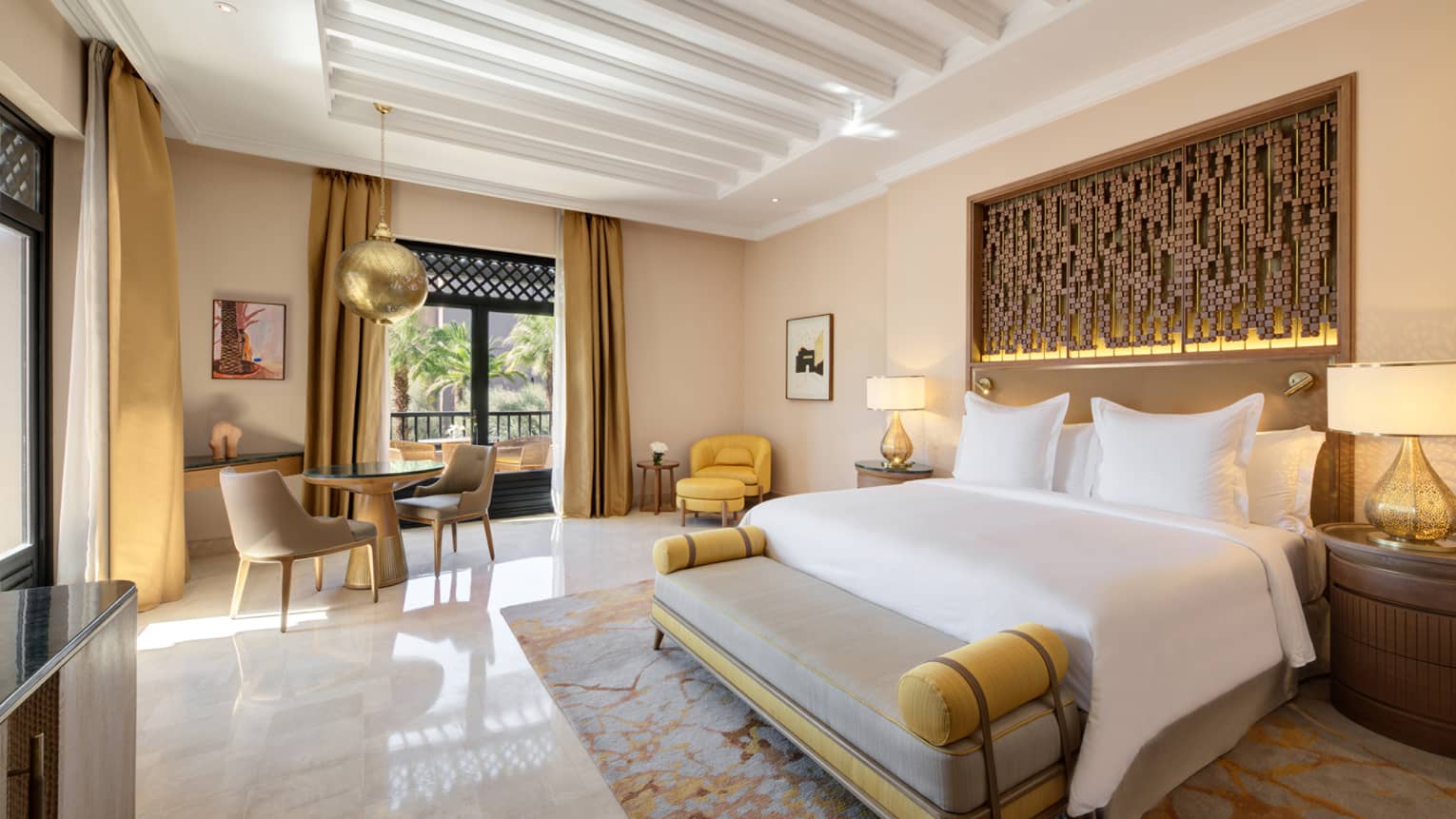 Moroccan hotel room with king bed