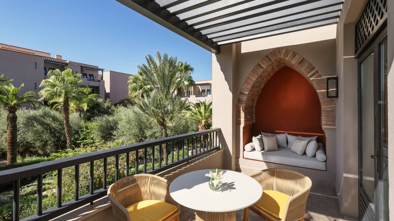 Hotel room terrace in Marrakech, overlooking gardens