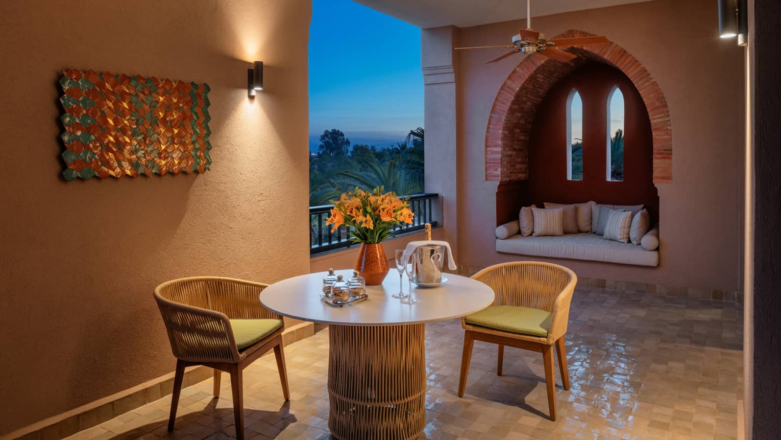 Hotel terrace with table and two chairs