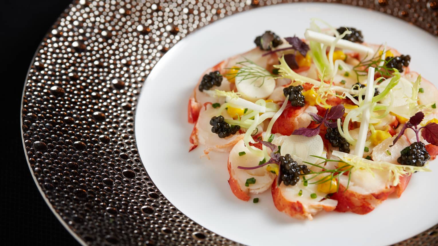 Lobster meat salad with fruits, vegetables and frisee lettuce