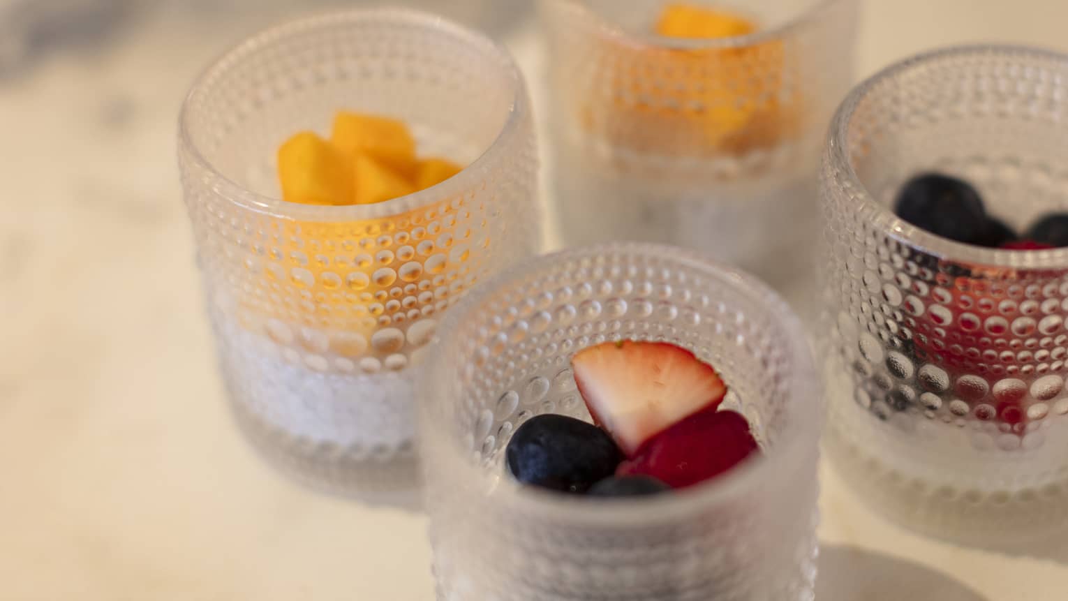 Glass jars filled with fruit