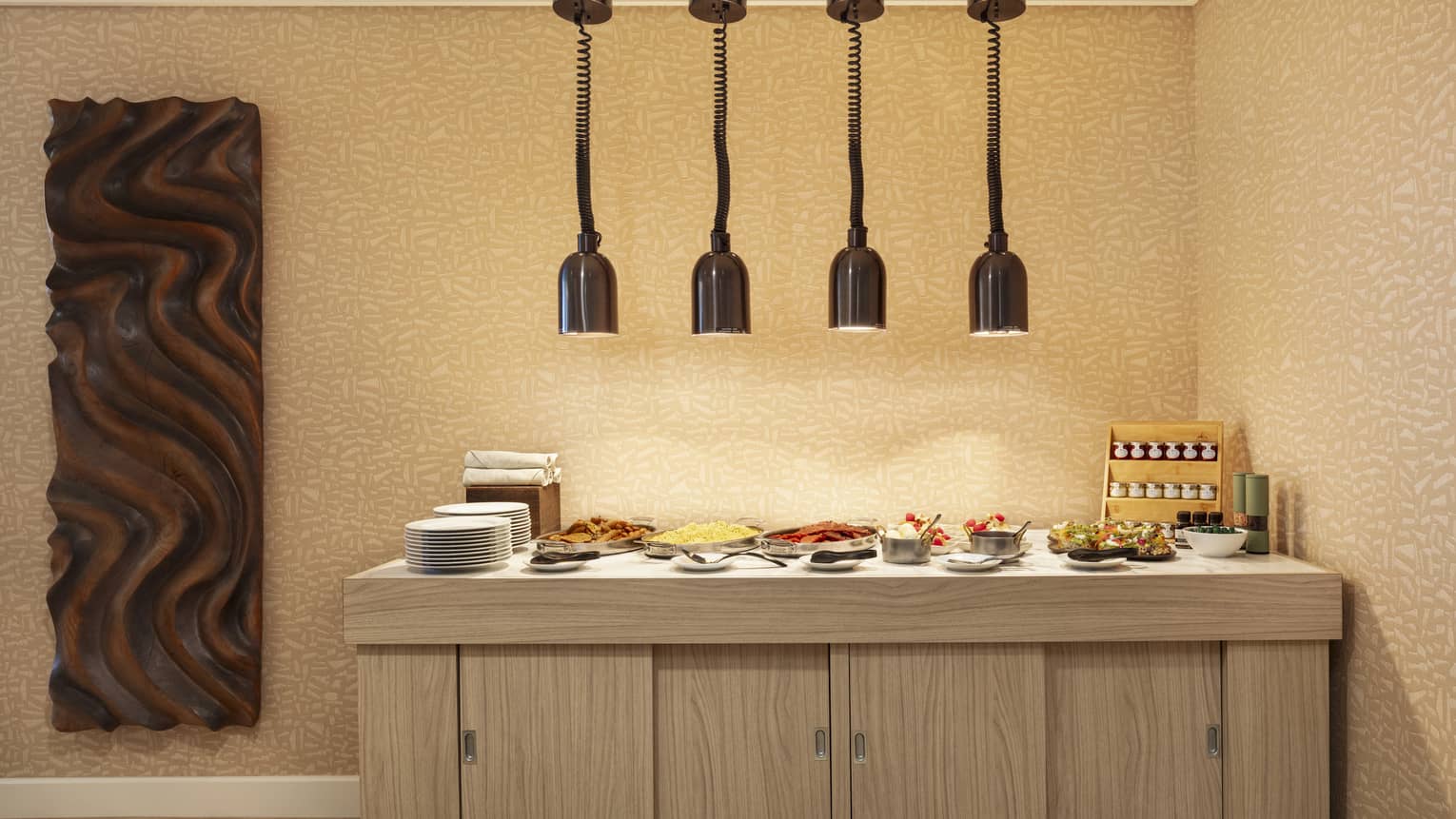 Breakfast buffet counter with four hot lamps