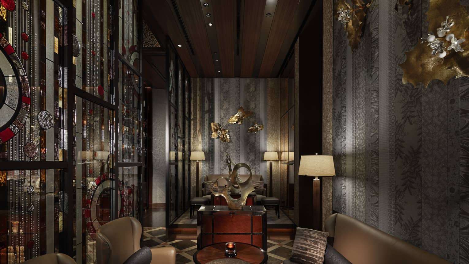 Private lounge area with leather chairs and couch, muted tones, gold wall decor 