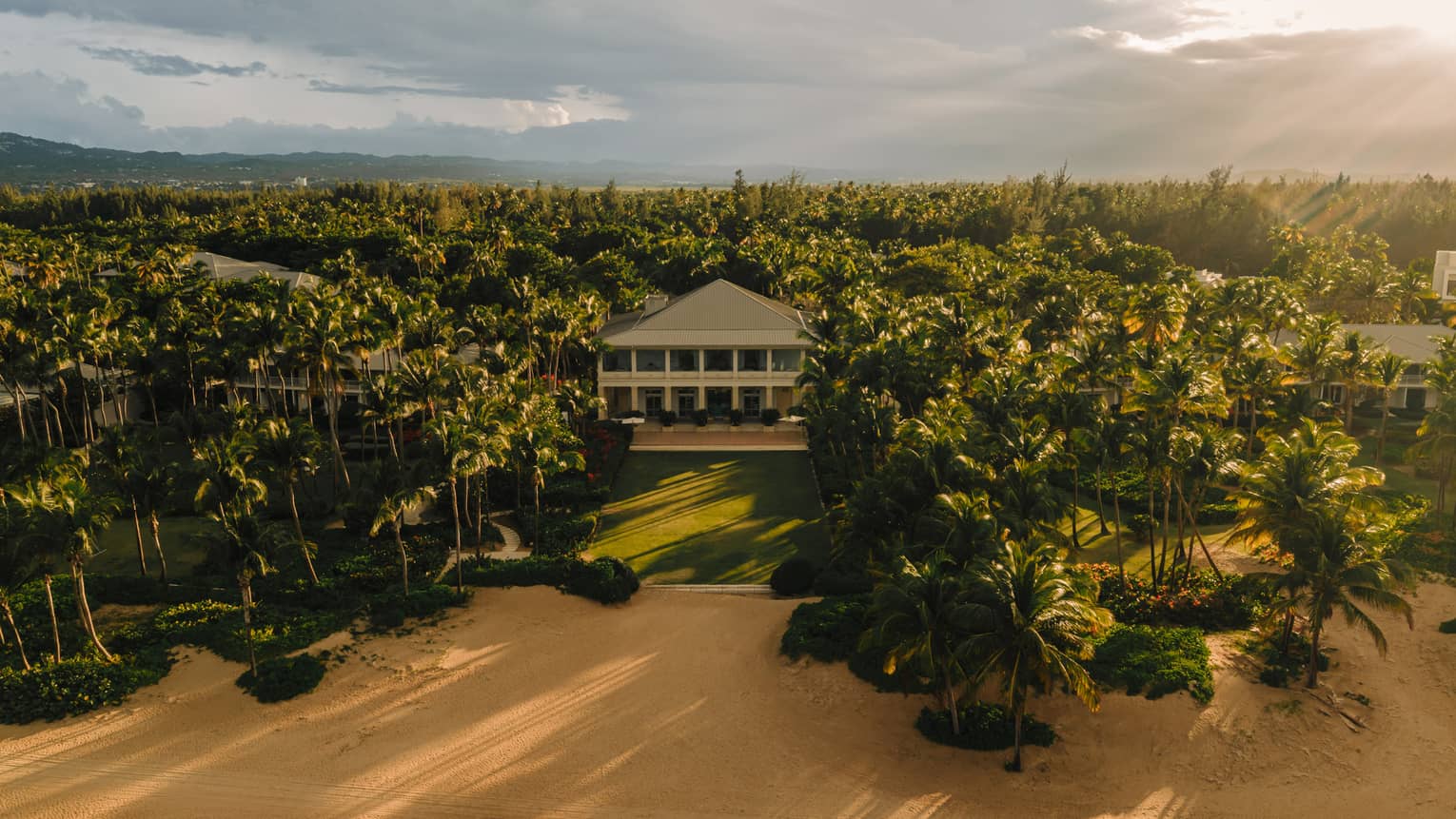 Aerial view of a Puerto Rico luxury resort on the beach, nestled in a nature reserve