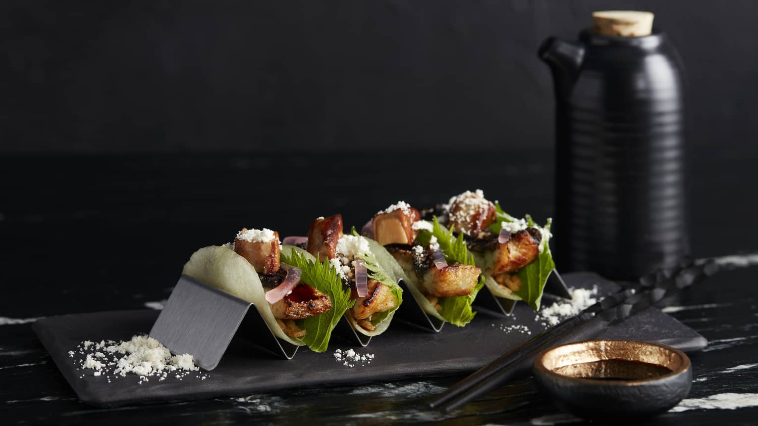 Akira Back's taco dish with fresh vegetables and fish