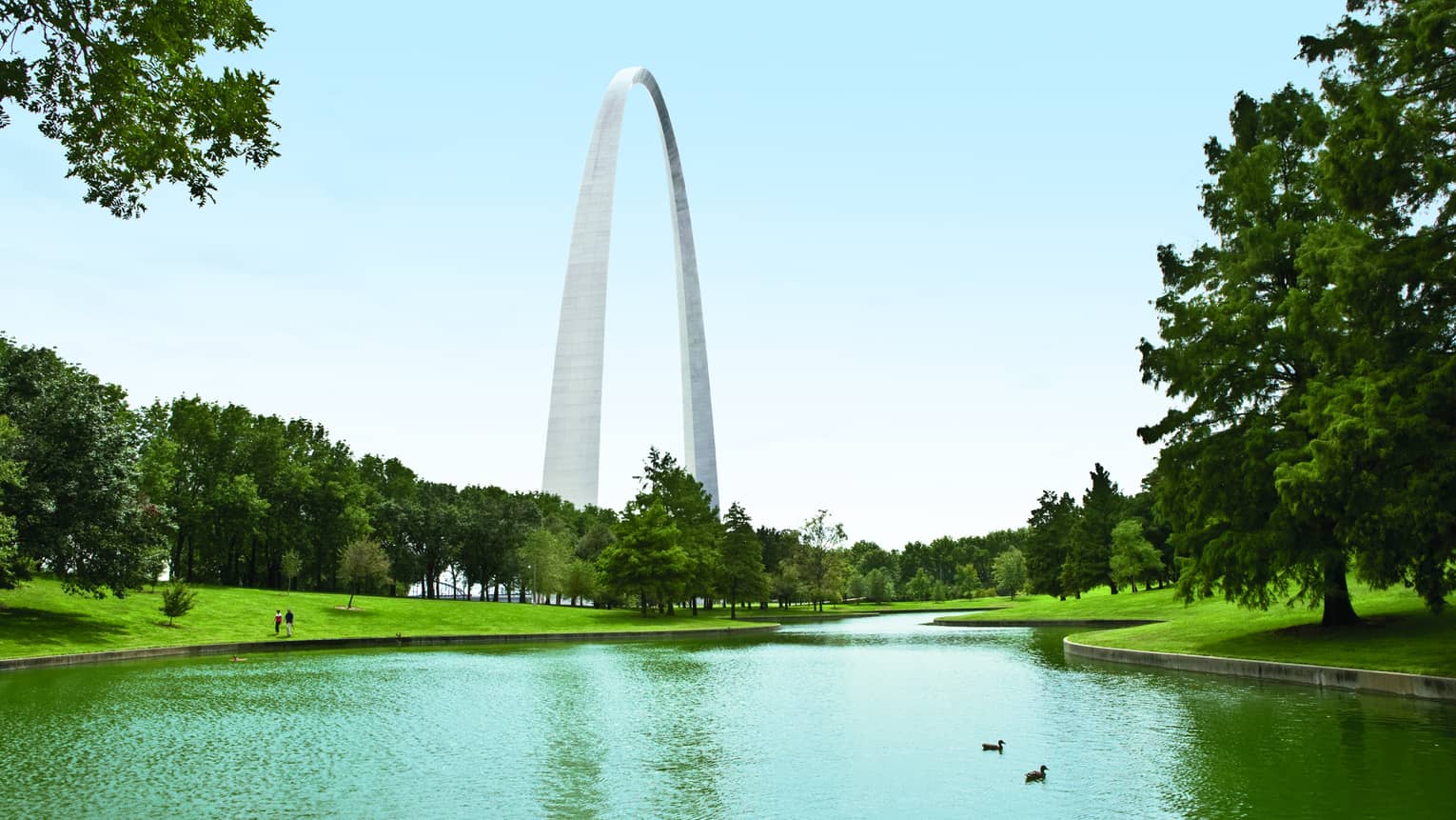 St Louis Gateway Arch over large park, pond
