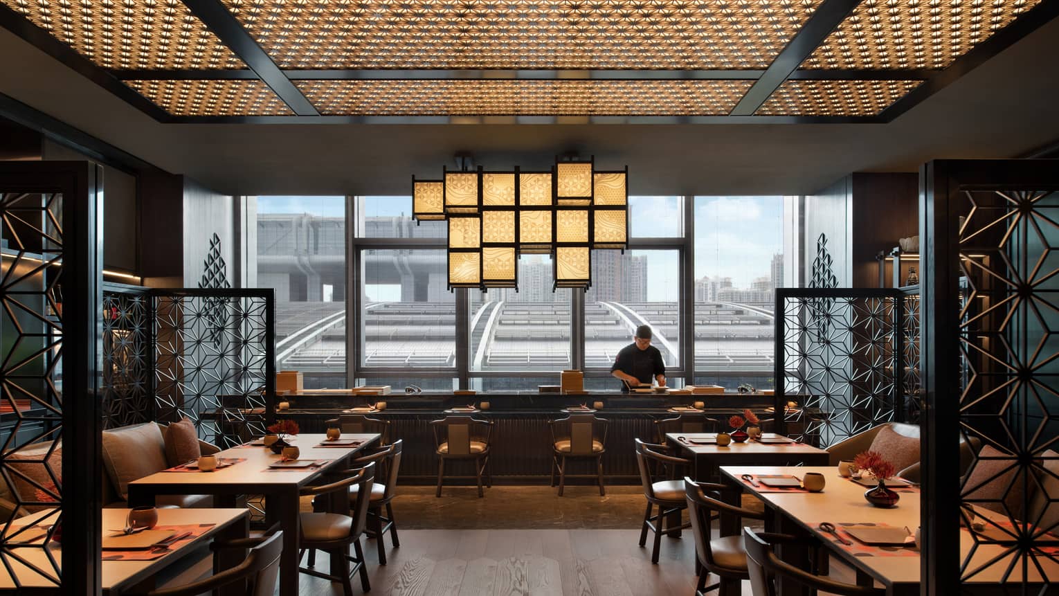 View of Teppanyaki counter at Matsuyi, downtown Shenzhen visible through floor-to-ceiling window