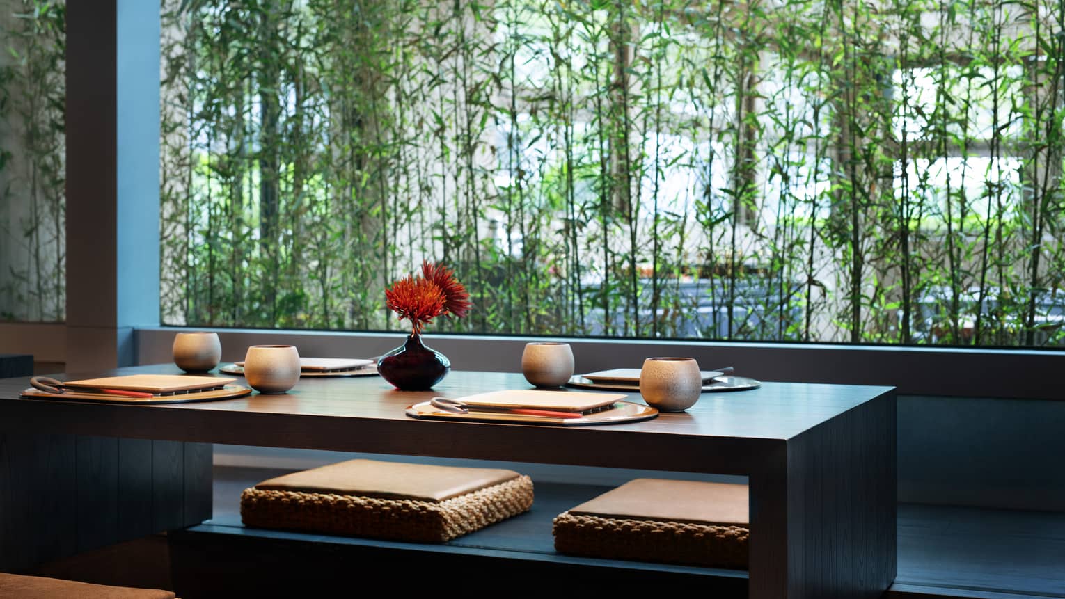 Matsuyi Tatami table flanked by vines of bamboo