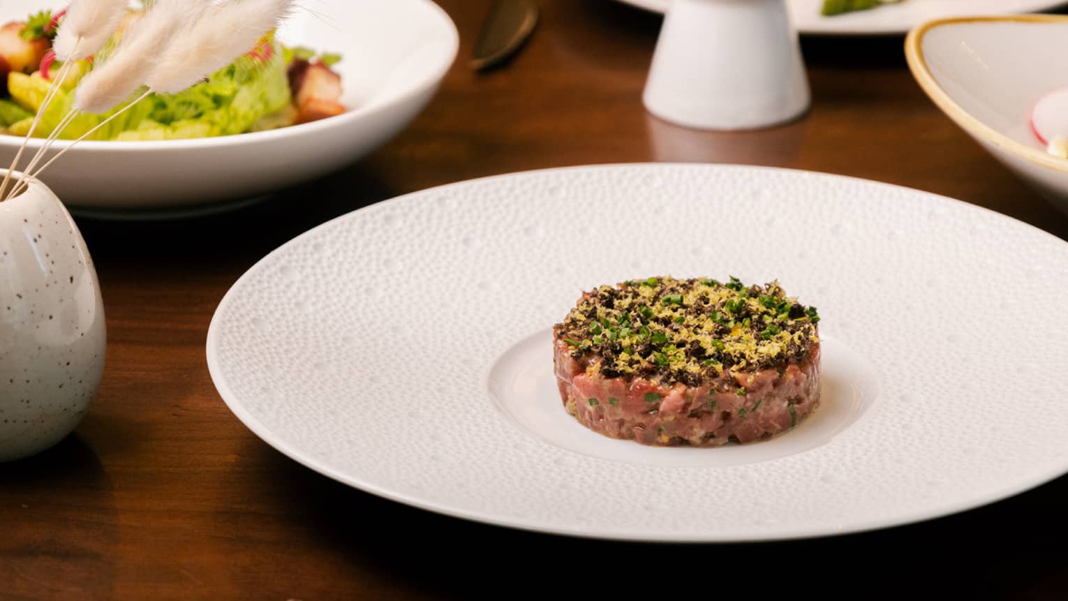 Tartare on a white plate.