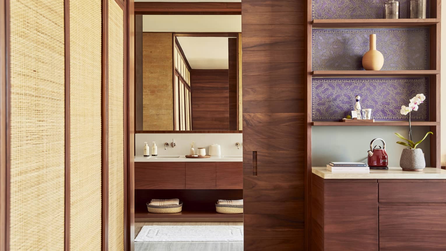 Resort bedroom, built-in wet bar, entrance to modern bathroom