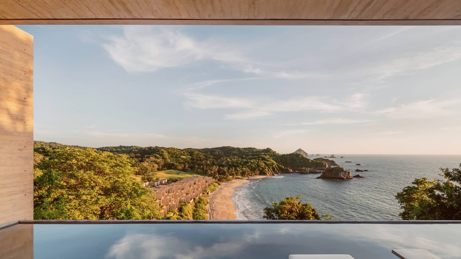 Pool terrace overlooking the beach and ocean