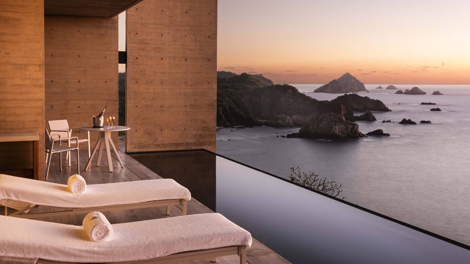 View of the Tamarindo coast and ocean from private resort suite terrace with pool