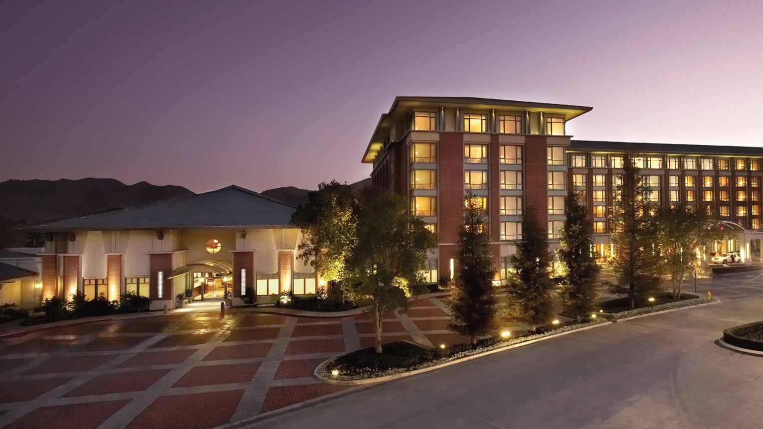 Four Seasons Hotel Westlake Village hotel exterior, lights, driveway at dusk