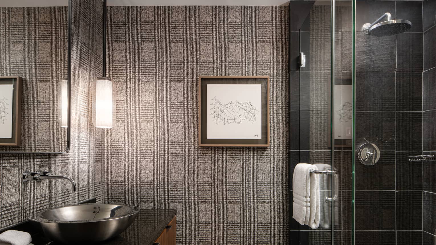 Bathroom with walk-in glass shower, artwork on wall