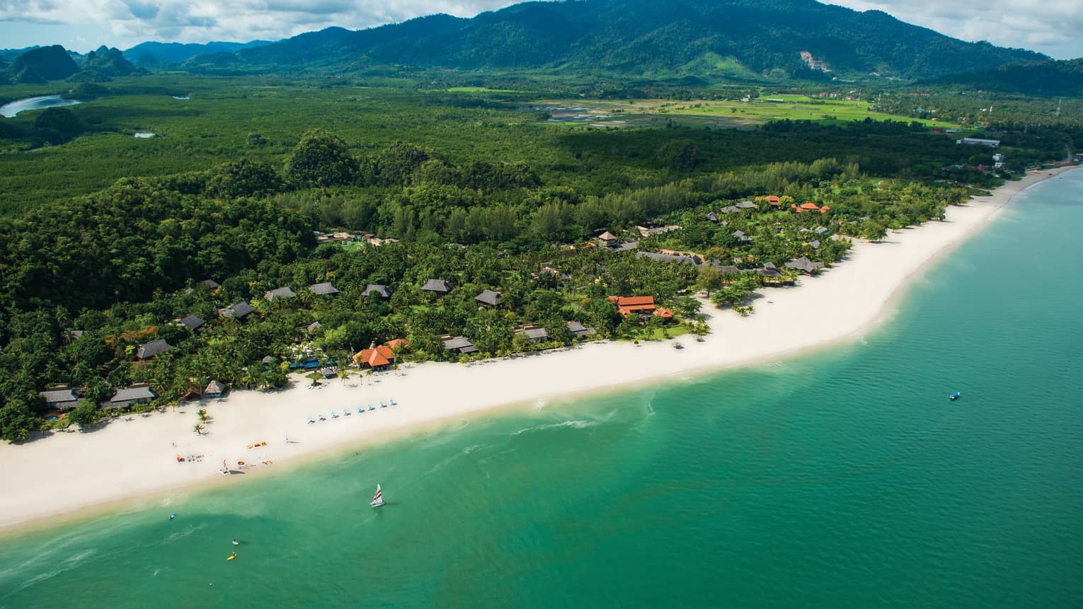 Aerial view of Four Seasons Langkawi Malaysia resort, white sand beach, ocean