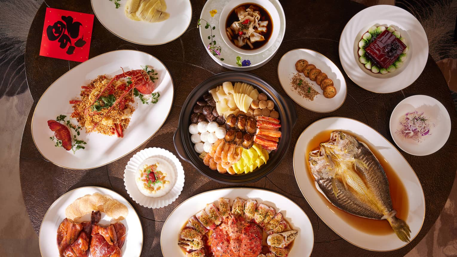 View of table with many Chinese dishes