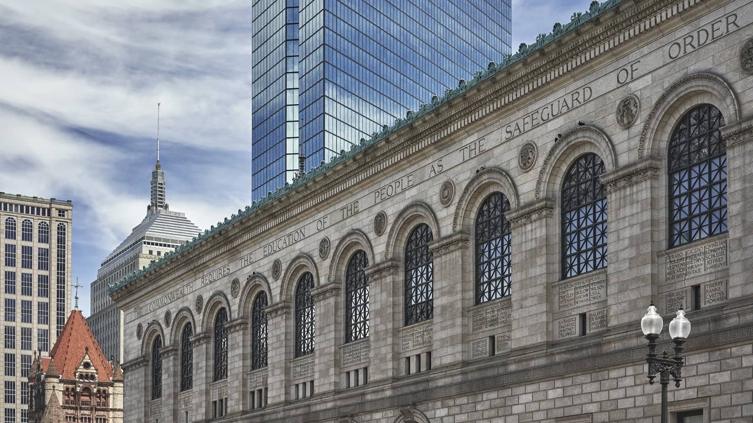 Exterior of a gray brick building in downtown boston