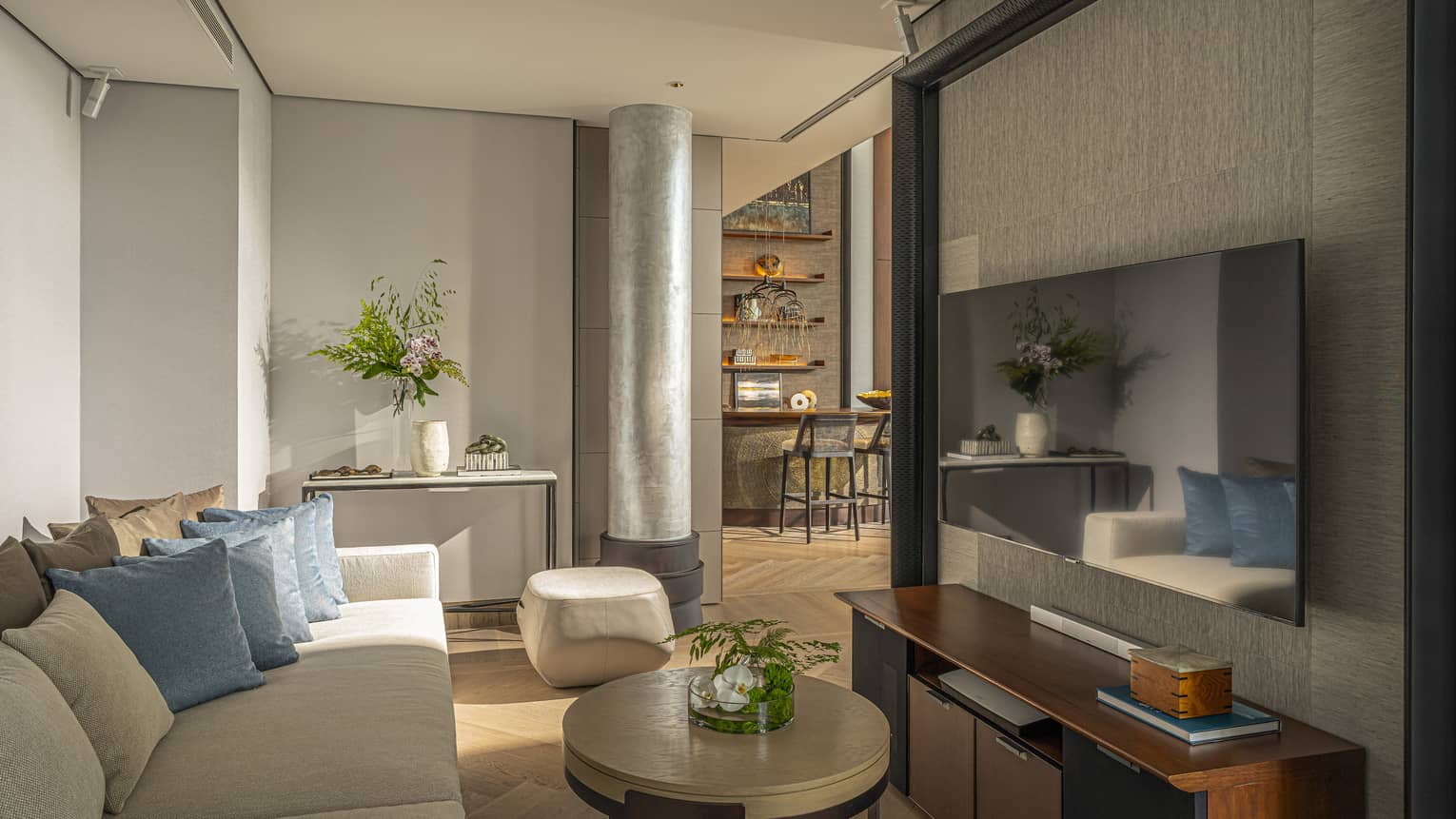 Sofa, coffee table and wall-mounted TV