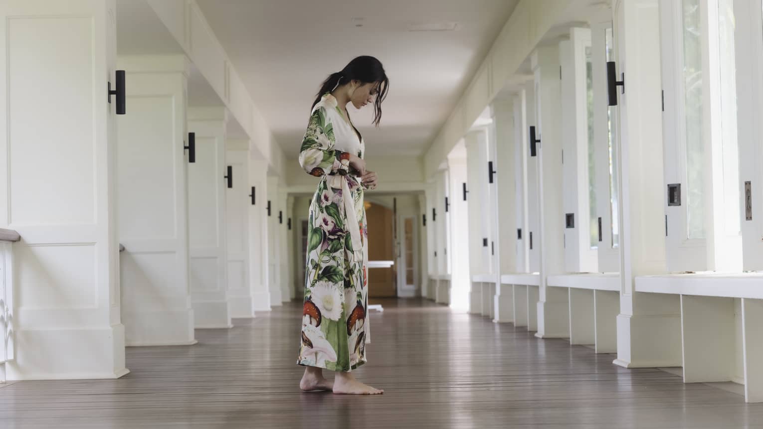 Woman wears colorful spa robe