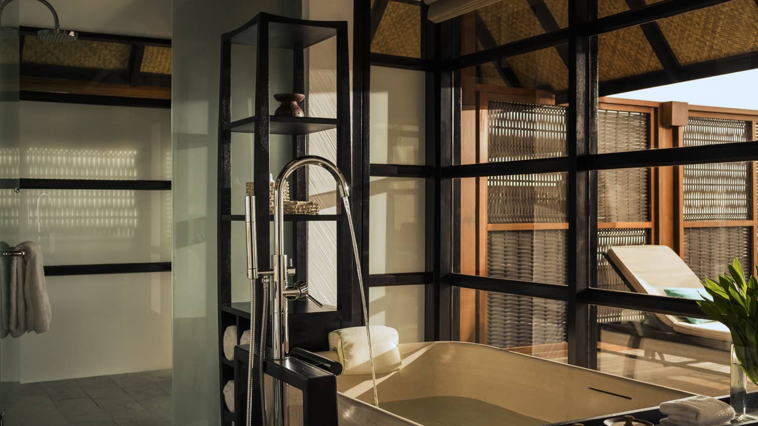 Luxury bathroom in a sunset water villa with pool